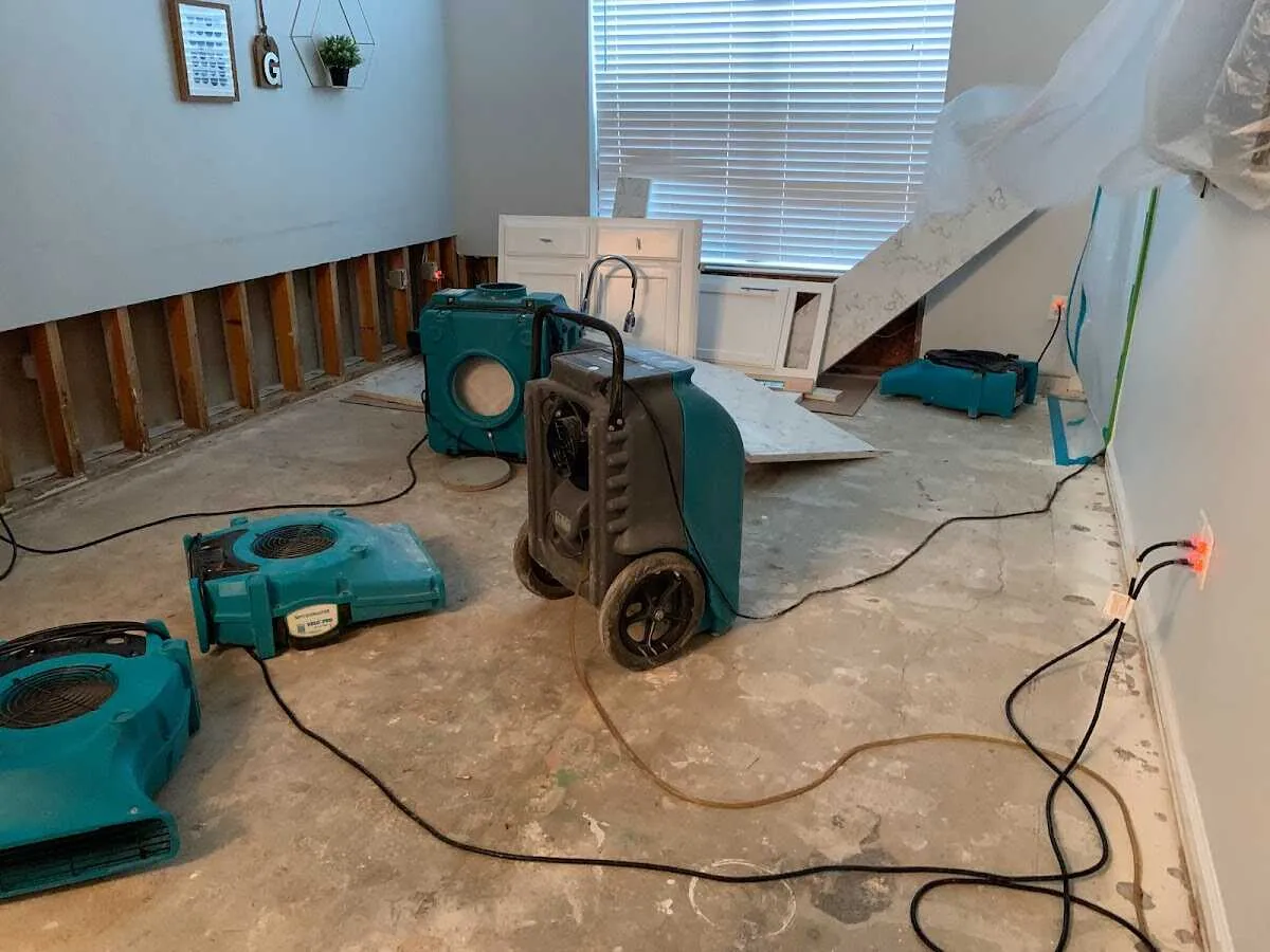 Dehumidifier in flood-cut room for Water Damage Restoration in East Donegal